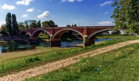 Old bridge over the Kupa river in Sisak, Croatia Stock Photos