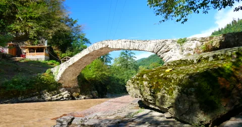 Old bridge over mountain river at Adjara, Georgia Stock-Footage 62471712