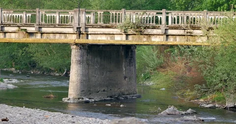 Old bridge over mountain river. Stock-Footage 89402628