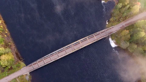 Old bridge over river during sunrise Stock-Footage 117199965
