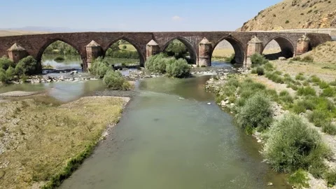 Old bridge over river Stock Footage 240758062