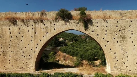 Old Bridge Under Ancient Canal Crows Fly Video stock 121472758