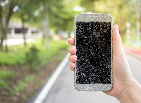 Old broken and cracked screen smartphone Stock Photos