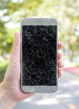 Old broken and cracked screen smartphone Stock Photos