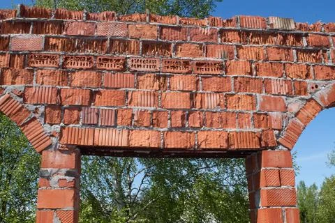 Old broken brick wall, damaged bricks close-up Stock Photos