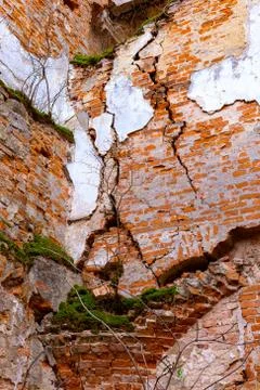 An old broken brick wall in an old castle. broken vaults Stock Photos