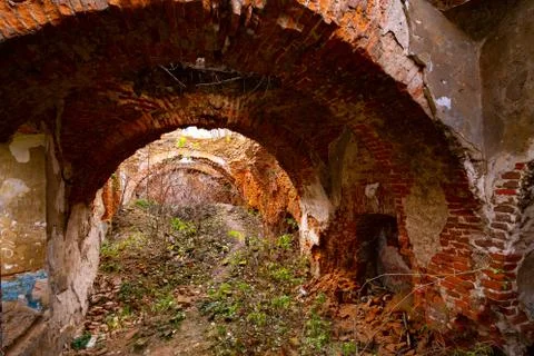 An old broken brick wall in an old castle. broken vaults Stock Photos