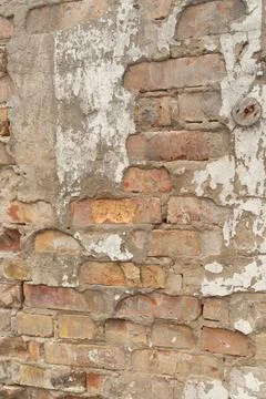 Old, broken brick wall texture. Abandoned, ruined building in Latvia, Europe. Stock Photos