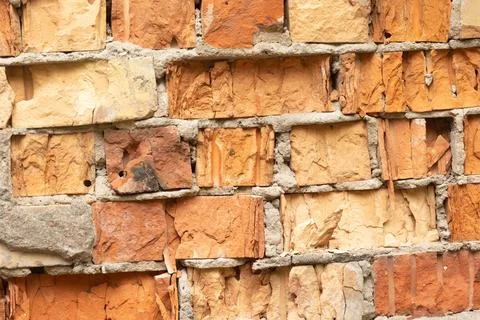 Old, broken brick wall texture. Abandoned, ruined building in Latvia, Europe. Stock Photos