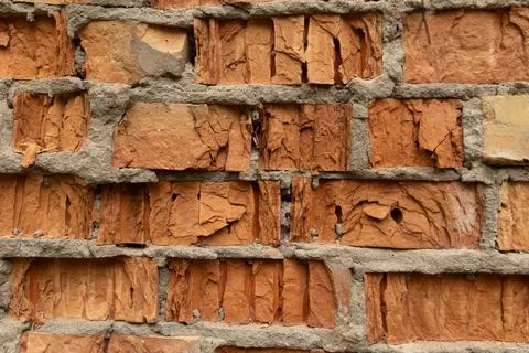 Old, broken brick wall texture. Abandoned, ruined building in Latvia, Europe. Stock Photos