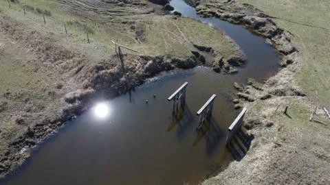 Old broken bridge Stockfoto's