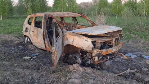 Old broken burnt car Stock Footage 275263658