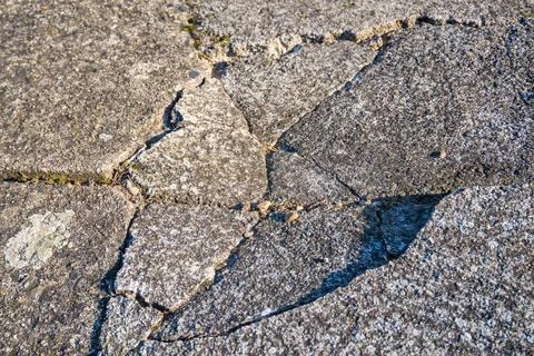 Old broken cement path on the street. Renovation concept. Textured Background Stock Photos