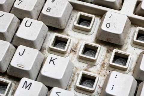 Old broken computer keyboard without keys closeup 스톡 사진