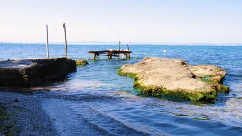 Old broken construction in sea Stock Footage 96571020