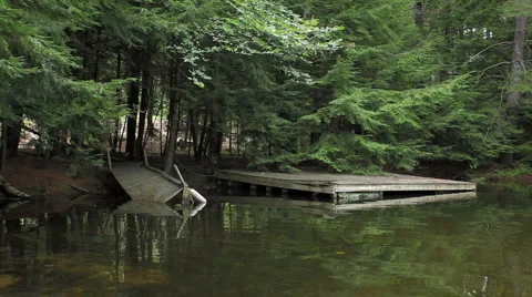Old broken dock on lake Stock Footage 954413