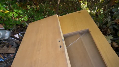 Old broken doors thrown in garbage dump Stock Footage 158977794
