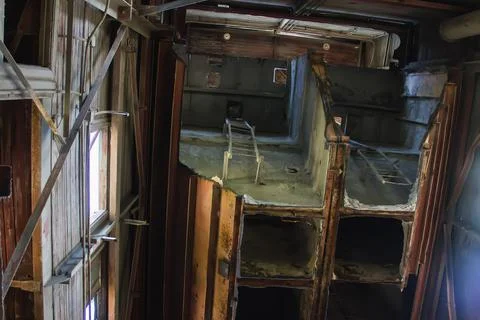 Old broken empty abandoned industrial building interior. abandoned factory Stock Photos