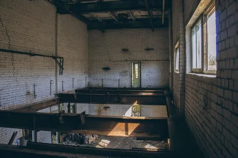 Old broken empty abandoned industrial building interior. abandoned factory Stock Photos