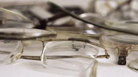 Old broken glasses Stock Footage 247713157