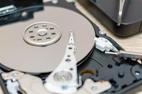 Old broken hard disk drives composition in a repair recovery service concept  Stock Photos