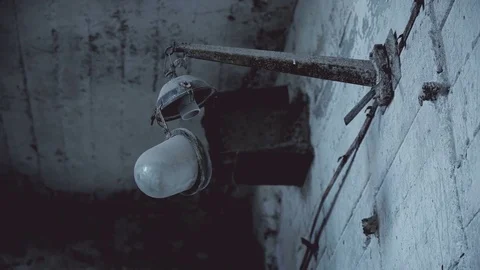 Old broken lamp in the destroyed building Stock Footage 76423625