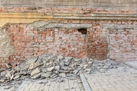 Old broken red brick wall Stock Photos
