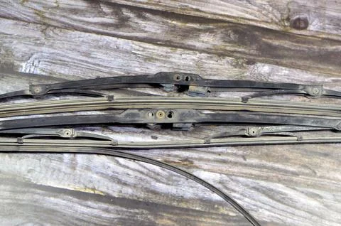 An old broken replaced windscreen windshield wipers, device used to remove .. Stock Photos