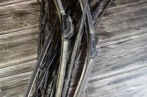 Old broken replaced windscreen windshield wipers, device used to remove rai.. Stock Photos