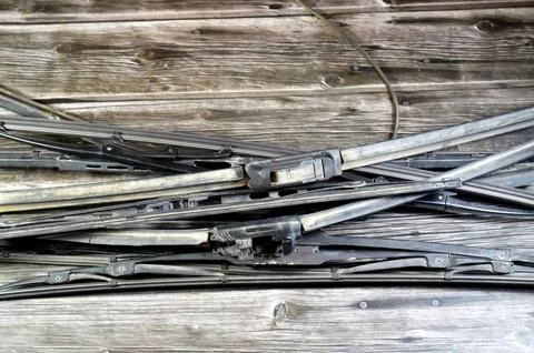 Old broken replaced windscreen windshield wipers, device used to remove rai.. Stock Photos