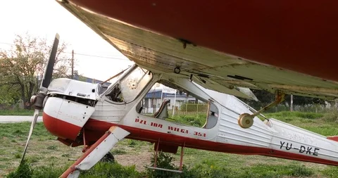 Old, Broken, Rusty plane in a field 스톡 동영상 114663823