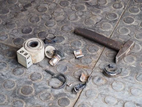 Old broken silent block removed from the car. Stock-Fotos