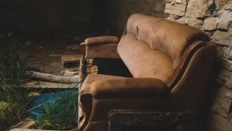 Old broken sofa Stock Footage 154059355