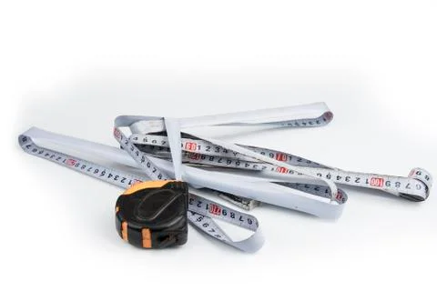 Old broken tape meter on a white Stock Photos