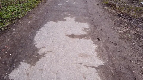 Old broken terrible road or walkway needs repair. Stock Footage 129389134