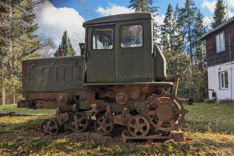 An old broken tractor without a goose in the woods, Stock Photos