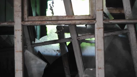 An old broken window in an abandoned building Stock Footage 305834700