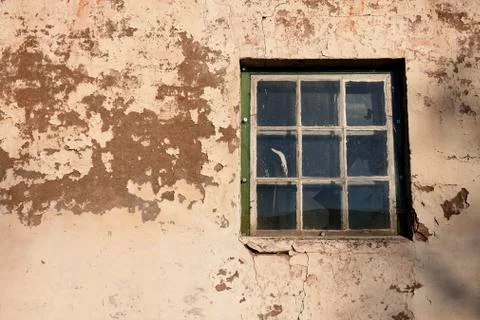 Old broken window to barn in stone and concrete Stock Photos