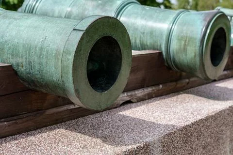 Old bronze cannons close up. Stock Photos