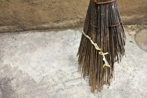 Old broom on the wall Stock Photos