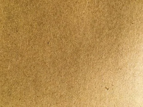 Old brown paper texture background or cardboard with copy space for design. Stock Photos