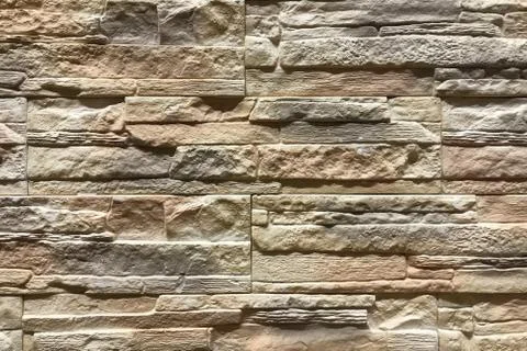 Old Brown Stone brick wall Pattern background. Interior decor and design text Stockfoto's