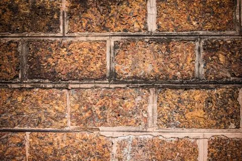 Old brown stone wall Stock Photos