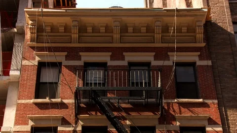 Old brownstone building Stock Footage 86220205