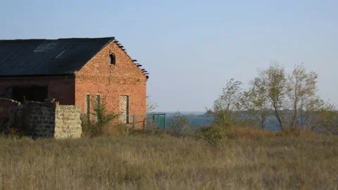 Old building on the background of the river and trees Stock Footage 151838194