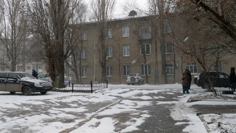 Old building on a background of snowfall Stock Footage 129521637