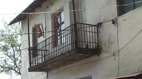 Old building with a balcony Stock Footage 980564