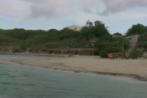 Old building on a beach 3 NTSC Stock Footage 320326