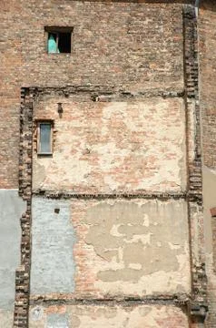 Old building brick wall with windows background Stock Photos