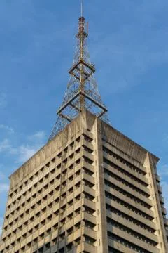 Old building with communication tower Stock Photos